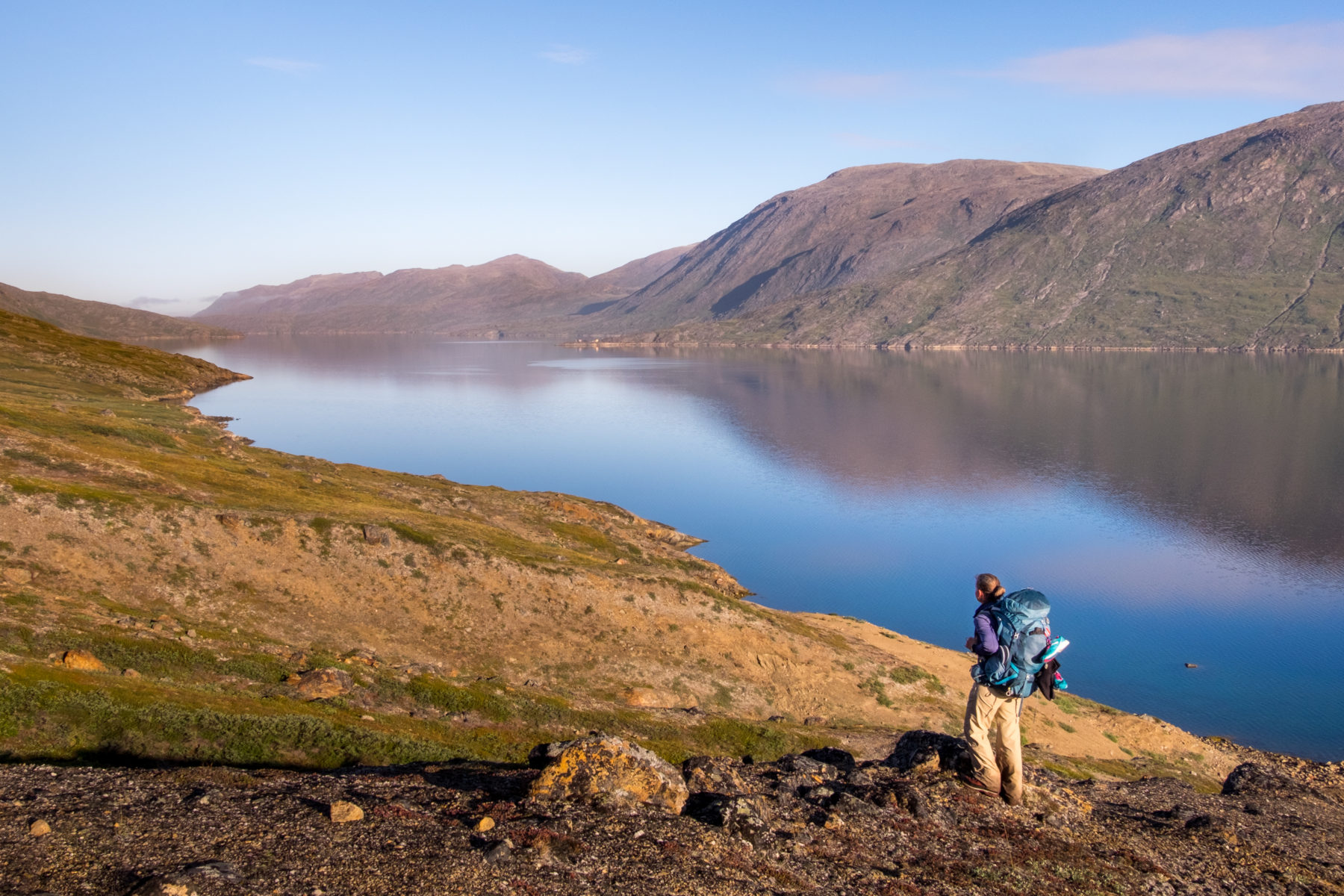 Hiking the Arctic Circle Trail on a perfect summer day beside the Kangerlussuaq Tulleq Fjord near Sisimiut