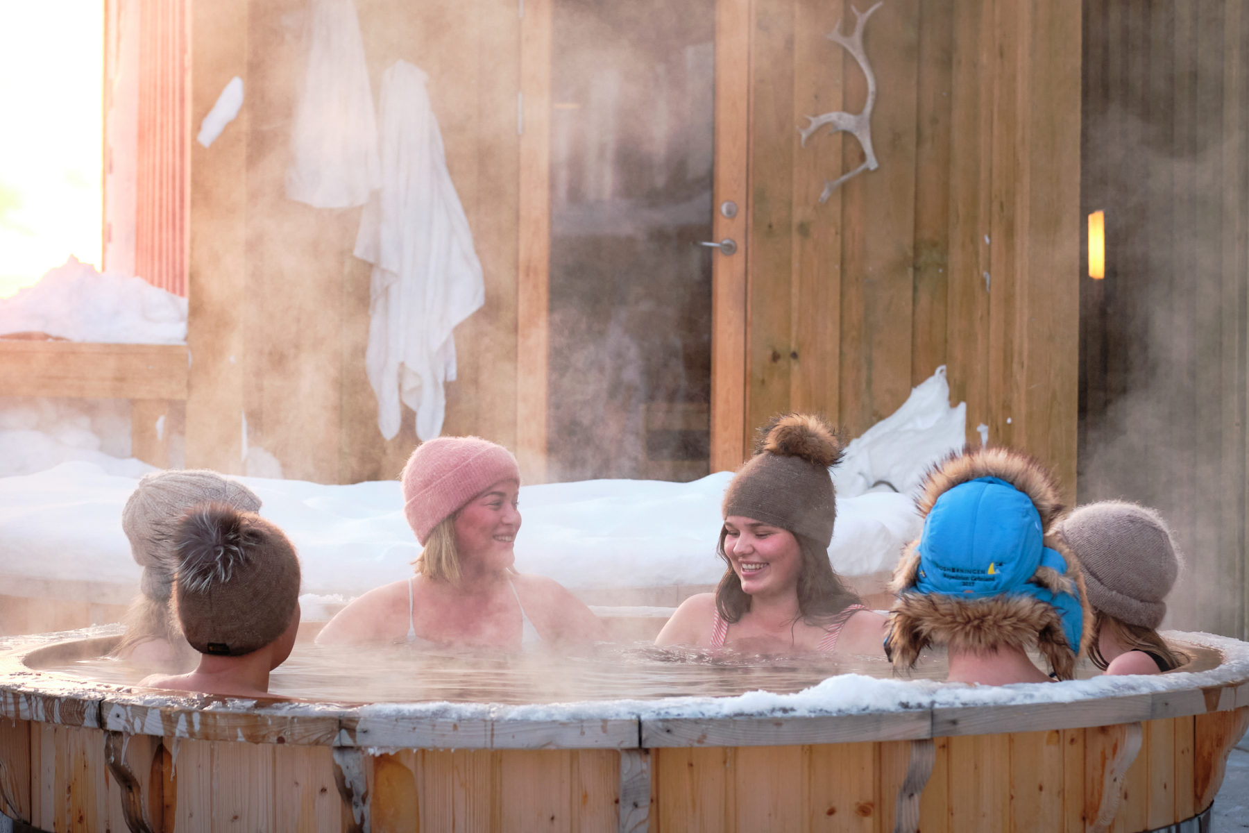 People enjoying an Arctic Spa and Sauna in Sisimiut