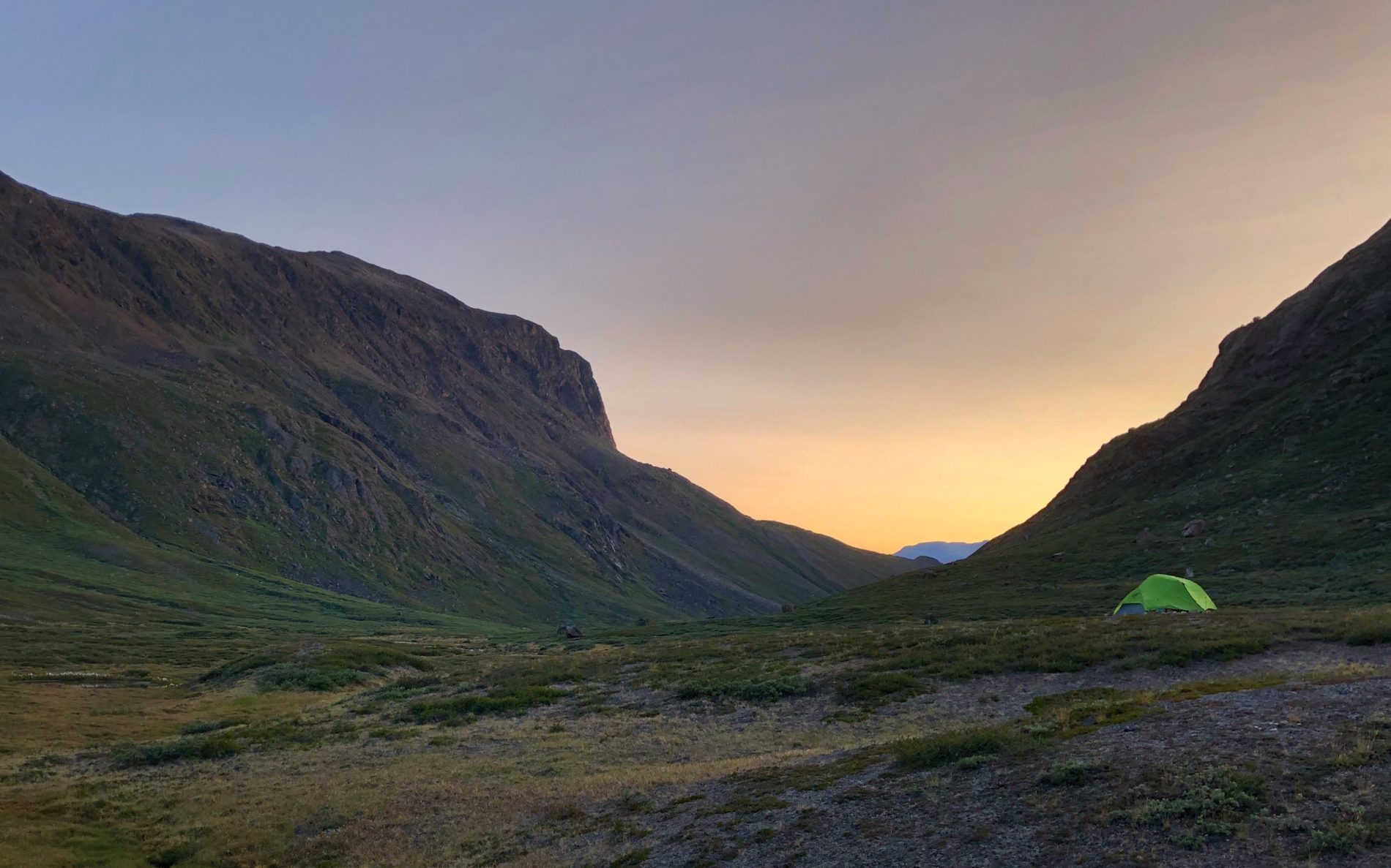 Wild camping at sunset along the Arctic Circle Trail. You must have the correct tent and other gear for this trek.