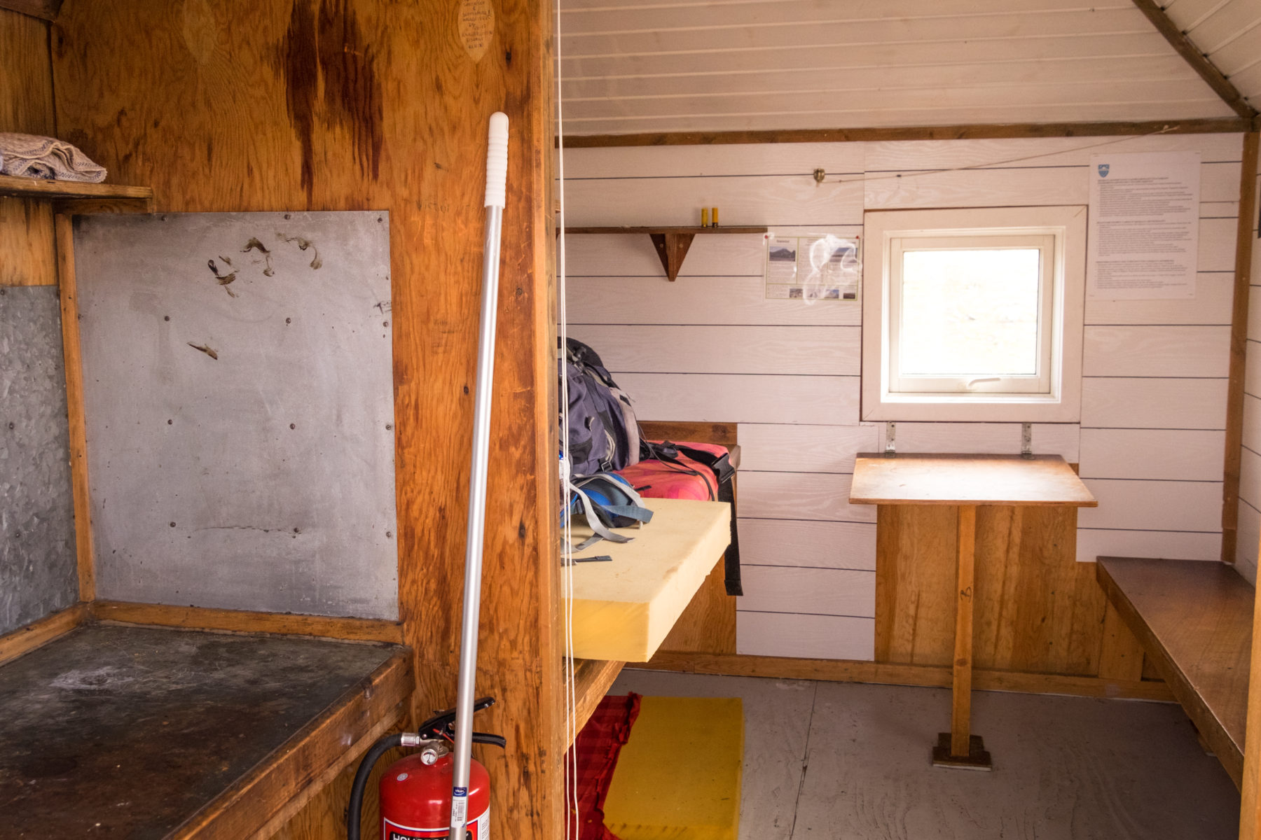 Inside Innajuatooq I hut on the Arctic Circle Trail